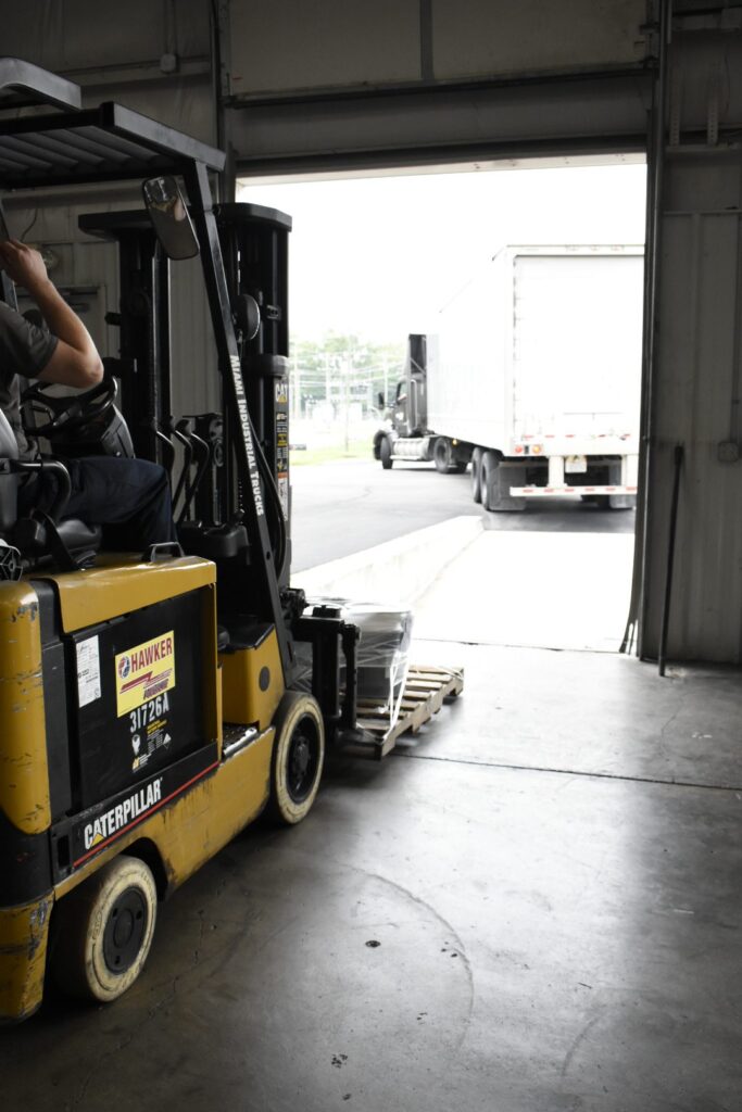 truck backing up into the loading dock